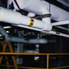Ammonia piping with styrofoam insulation with saddles and .030 pvc jacket at a food processing plant